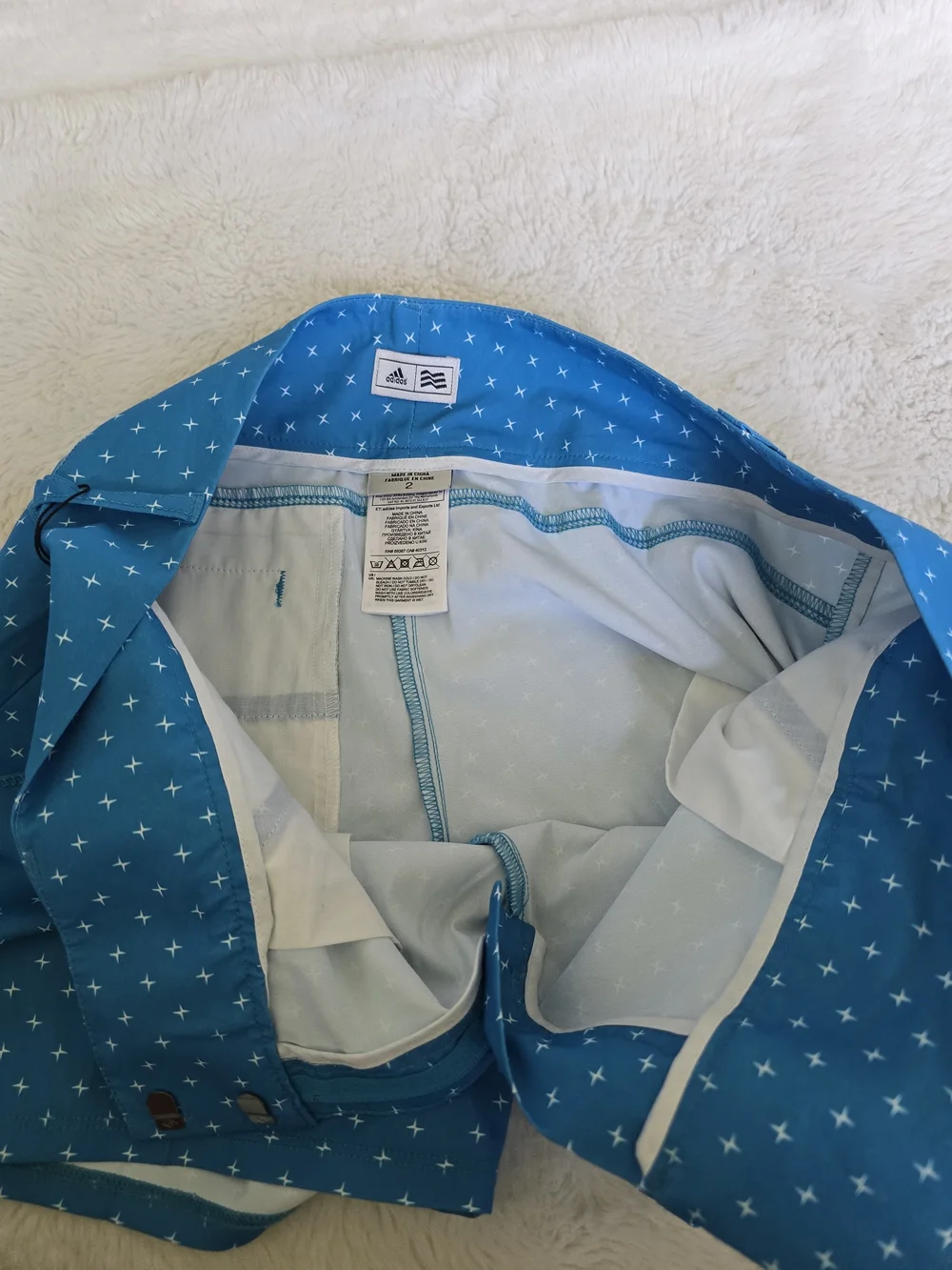 adidas Women's Blue Polo with White Cross Print